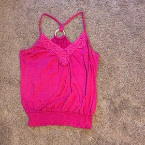 Pink ruffled tank top.